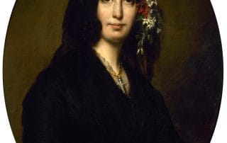 Portrait de George Sand dans son salon à Nohant, peinte par Auguste Charpentier, symbolisant la liberté d’esprit, l’indépendance féminine et l’élégance intellectuelle d’une des grandes figures du libertinage moderne au XIXe siècle.