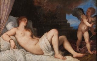 Danaé allongée sur un lit, le corps légèrement voilé, recevant des gouttes d’or — tableau de Titien.