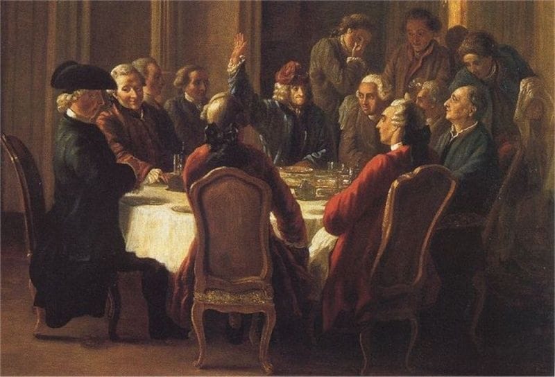 Peinture du XVIIIᵉ siècle montrant un groupe de philosophes et intellectuels réunis autour d’une table dans un salon, discutant avec animation, symbole du passage du libertinage intellectuel aux idéaux collectifs des Lumières.